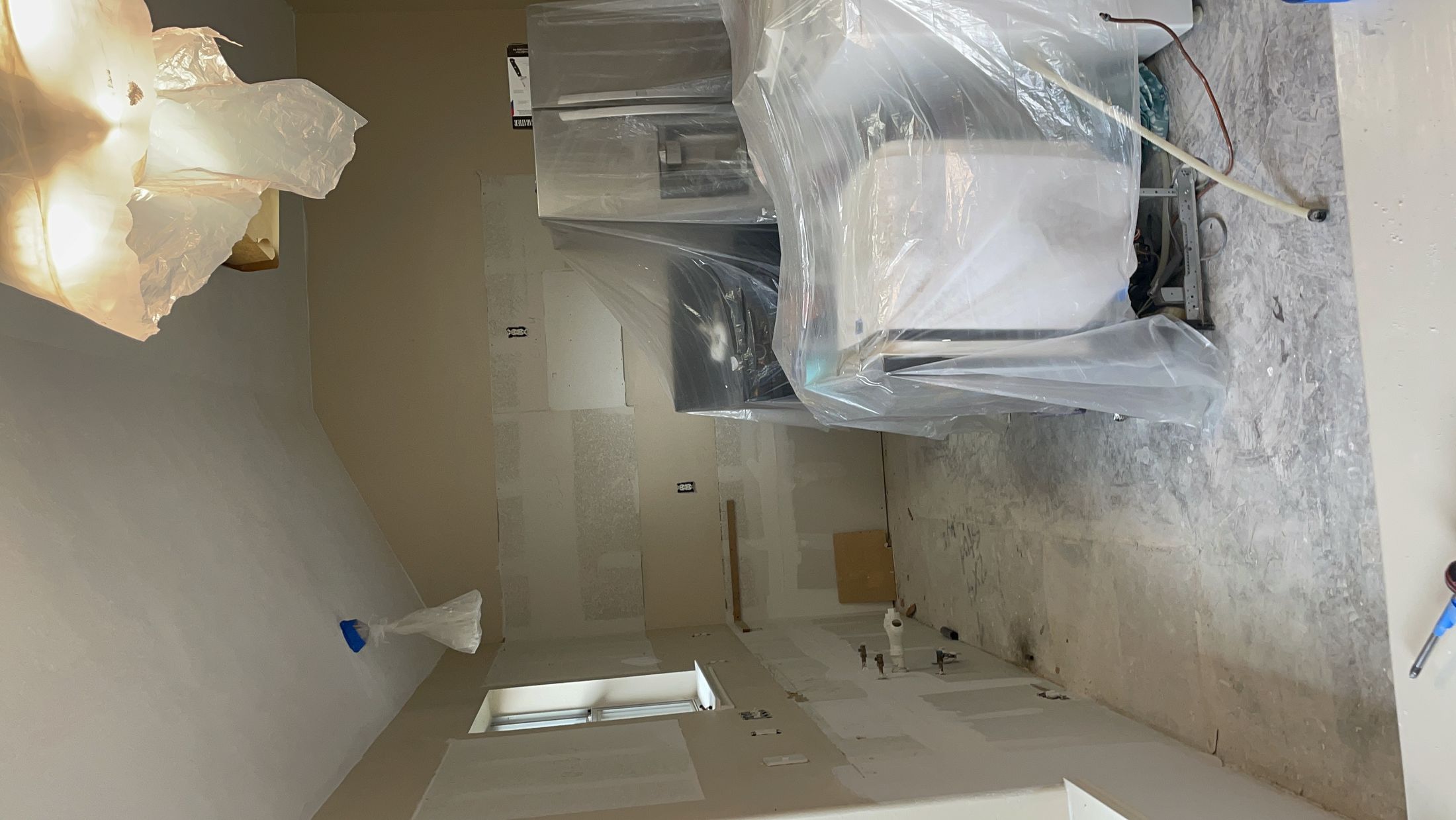 Kitchen wall and drywall reconstruction
